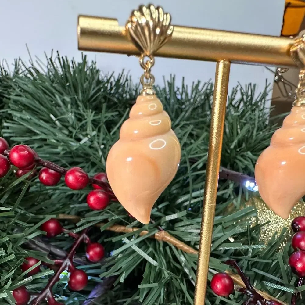 Conch stud earrings